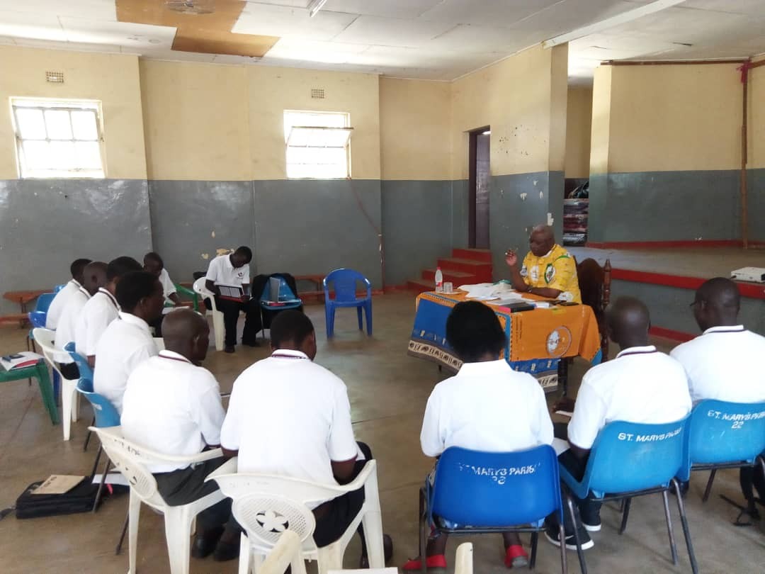 The local Missionaries reporting to the Bishop after their first Missionary visits.jpg